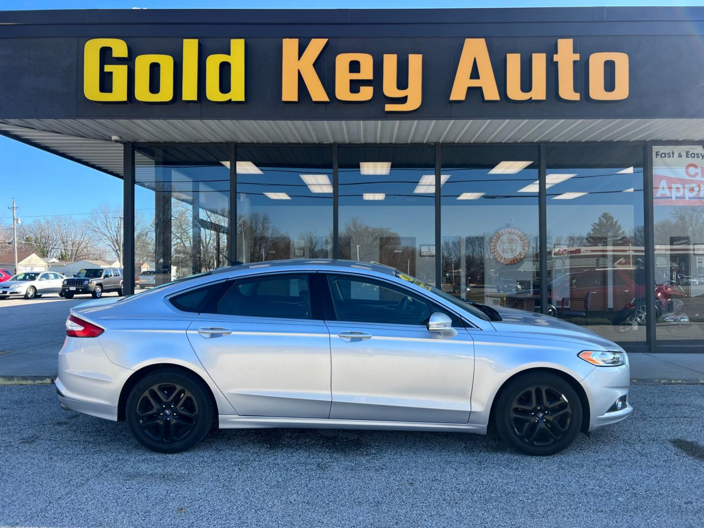 2015 Ingot Silver Ford Fusion SE (3FA6P0HD7FR) with an 1.5L L4 DOHC 16V engine, 6-Speed Automatic transmission, located at 1633 W Kimberly, Davenport, IA, 52806, (563) 323-5341, 41.559456, -90.598732 - Photo#0